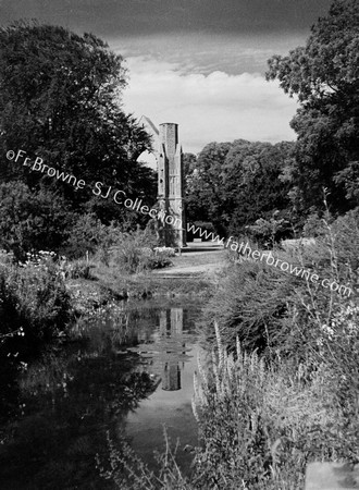 ABBEY REFLECTED IN STREAM